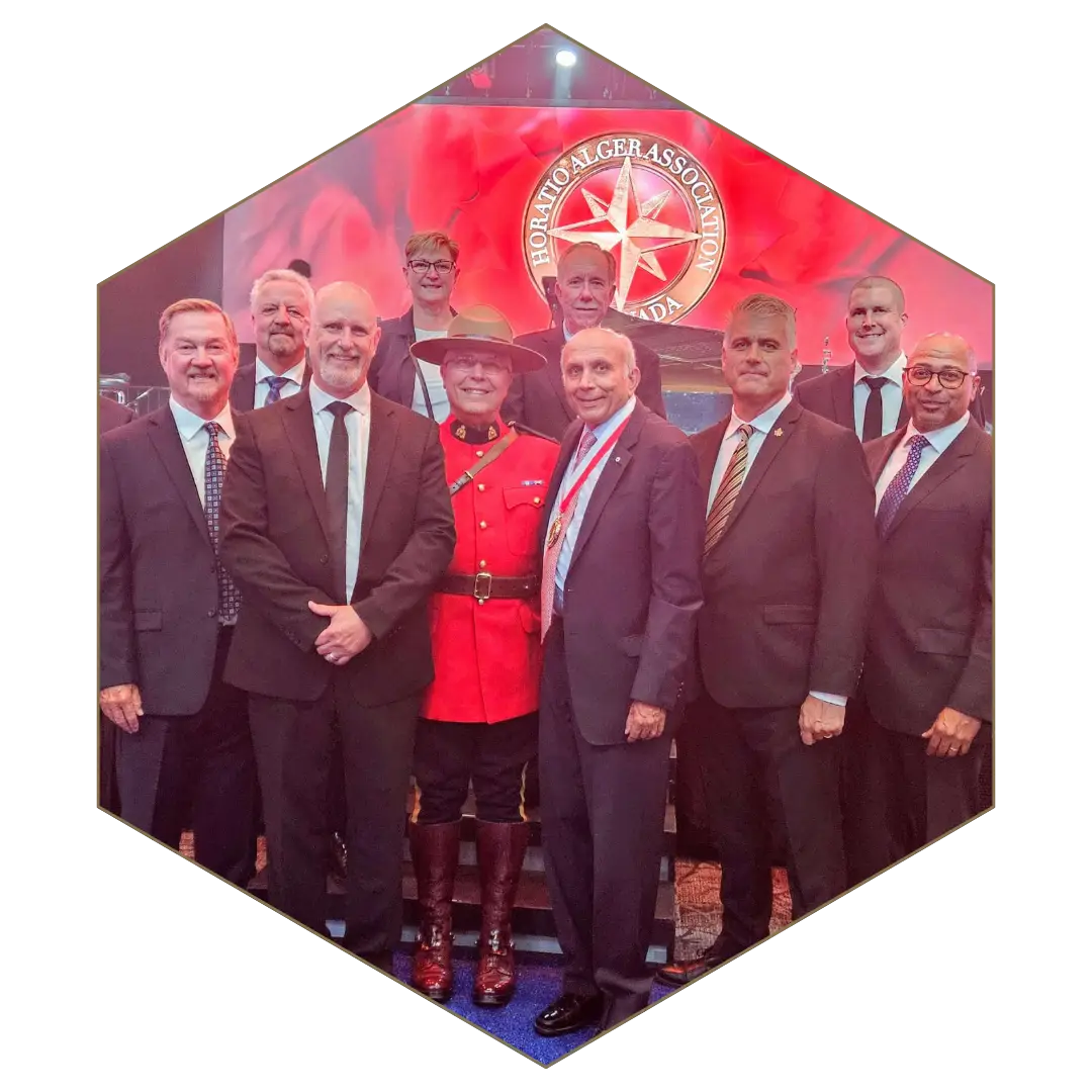 Glacis Security executive protection team with RCMP officer at formal security event.